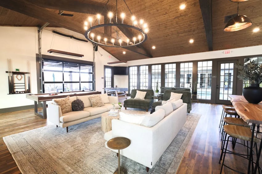 Sofas pool table and bar area living room at Maverick Hills in Central Student Accommodation
