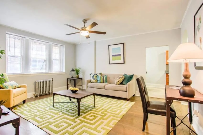 Sofa rug coffee table chair living room at Campus Apartments Philadelphia in Philadelphia Student Accommodation