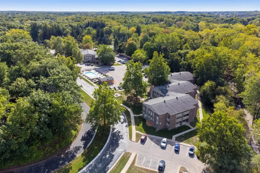 Apartment buildings pool parking lot exterior at Campus Hill Apartments in Ithaca Student Accommodation