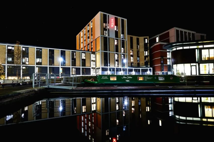 Modern student accommodation buildings and canal boat exterior at Vita Student Fountainbridge - Edinburgh in Edinburgh Student Accommodation