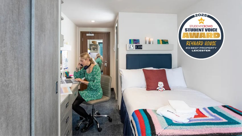 Student at desk and bed bedroom at Reynard House in Leicester Student Accommodation