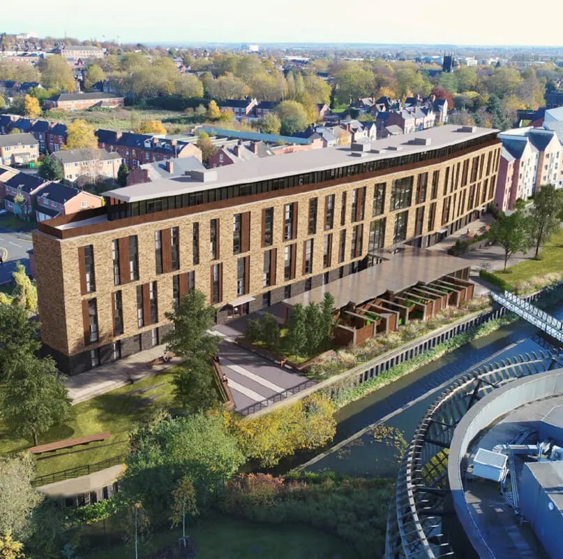 Modern student accommodation building with outdoor seating exterior at Bridgeside in Nottingham Student Accommodation