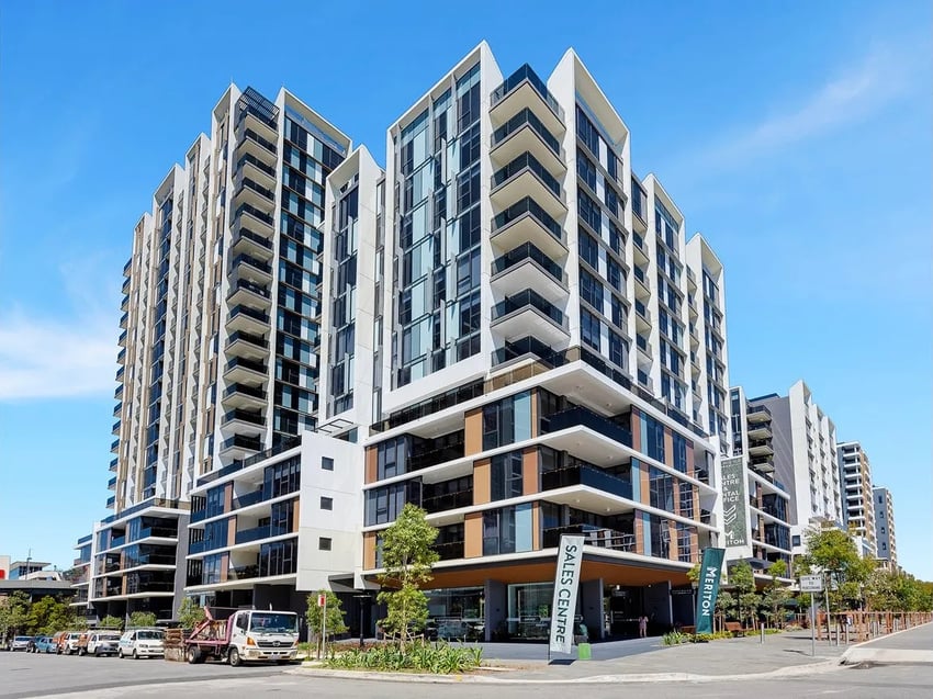 Modern apartment buildings with balconies and glass windows exterior at Belong Eastgardens in Sydney Student Accommodation