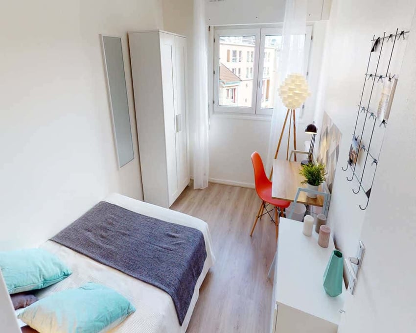 Bed wardrobe desk chair and window bedroom at Chambre dans le Place de la Montagne du Goulet in Paris Student Accommodation
