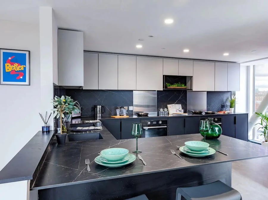 Modern kitchen with black marble island and appliances kitchen at Limelight in Liverpool Student Accommodation