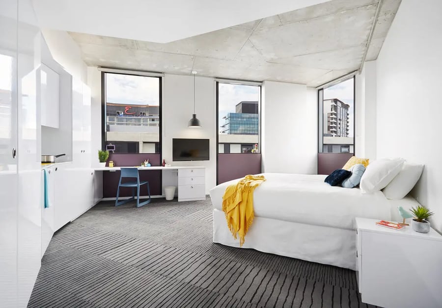 Bed desk and kitchen unit studio apartment at Scape South Bank in Brisbane Student Accommodation