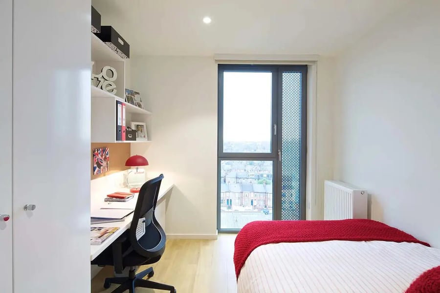 Bed desk shelves and window bedroom at Wood Lane Studios in London Student Accommodation