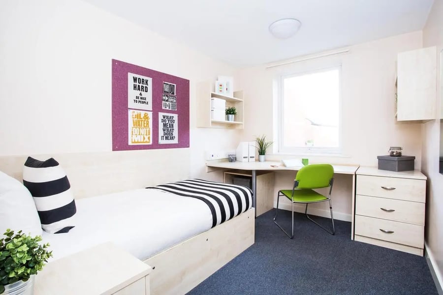 Bed desk chair and drawers bedroom at The Grange Leicester in Leicester Student Accommodation