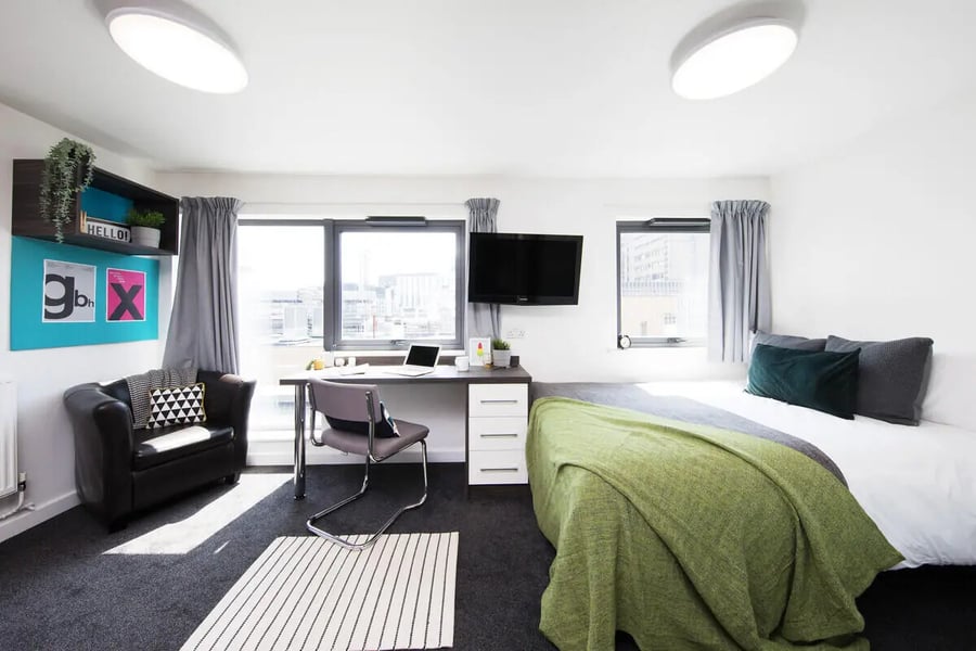 Bed desk chair sofa television bedroom at Prospect Point in Liverpool Student Accommodation