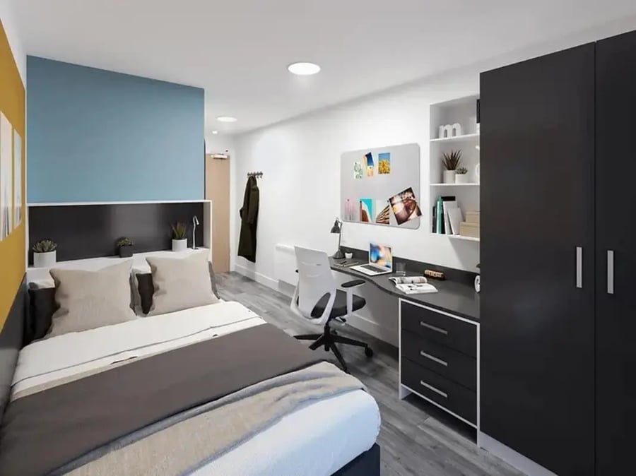 Bed desk whiteboard wardrobe bedroom at Depot Point in London Student Accommodation