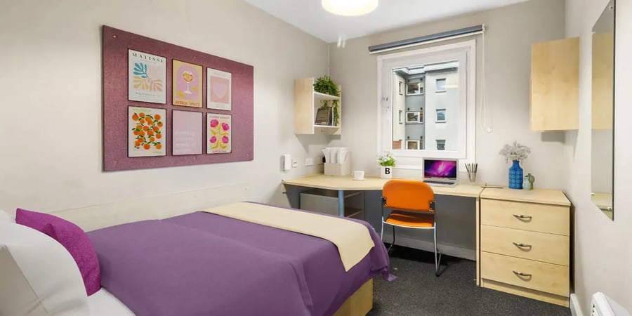 Bed desk chair and dresser bedroom at The Heights in Birmingham Student Accommodation