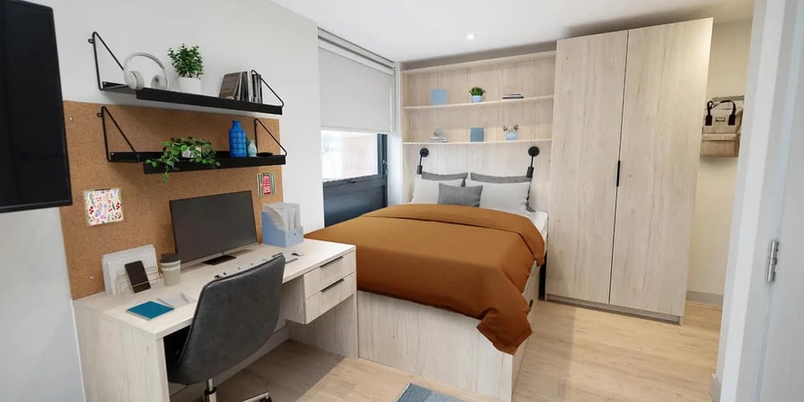 Desk bed wardrobe shelves and computer bedroom at Canvas Student - Quintana Gate in Exeter Student Accommodation