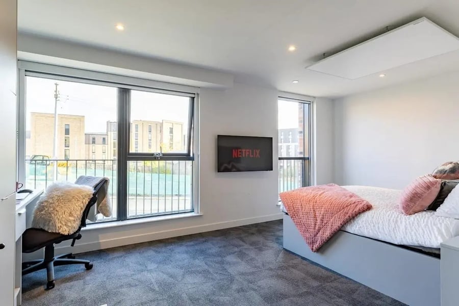 Desk chair and bed with Netflix television bedroom at Glasgow West-End in Glasgow Student Accommodation