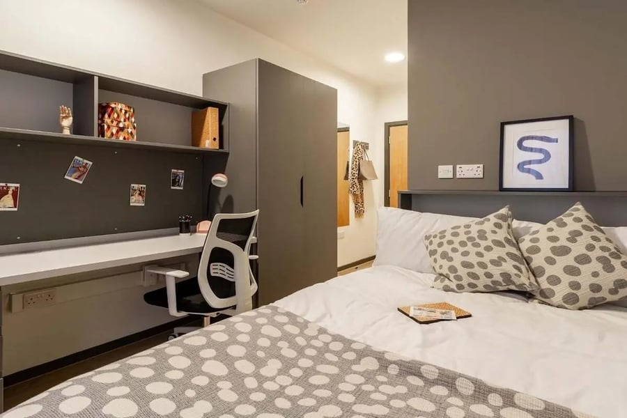 Desk chair shelving wardrobe and bed bedroom at The Tannery Leicester in Leicester Student Accommodation