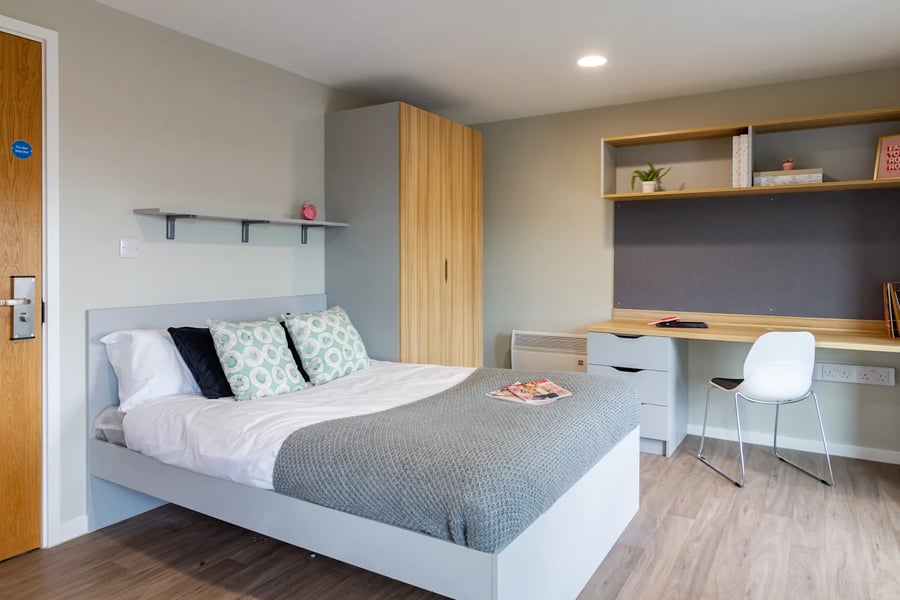 Bed desk and wardrobe student bedroom at Gulson Gardens in Coventry Student Accommodation
