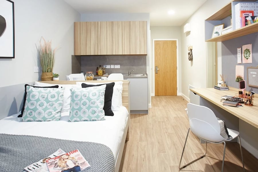 Bed desk kitchen and door bedroom at Gulson Gardens in Coventry Student Accommodation