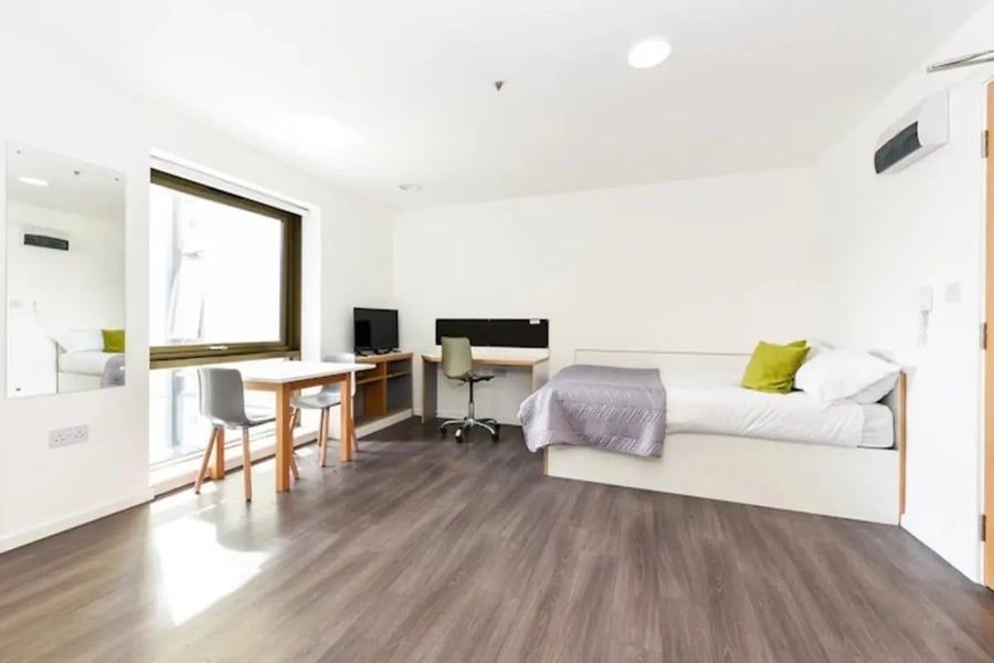 Bed desk chair table mirror bedroom at Byrom Point in Liverpool Student Accommodation