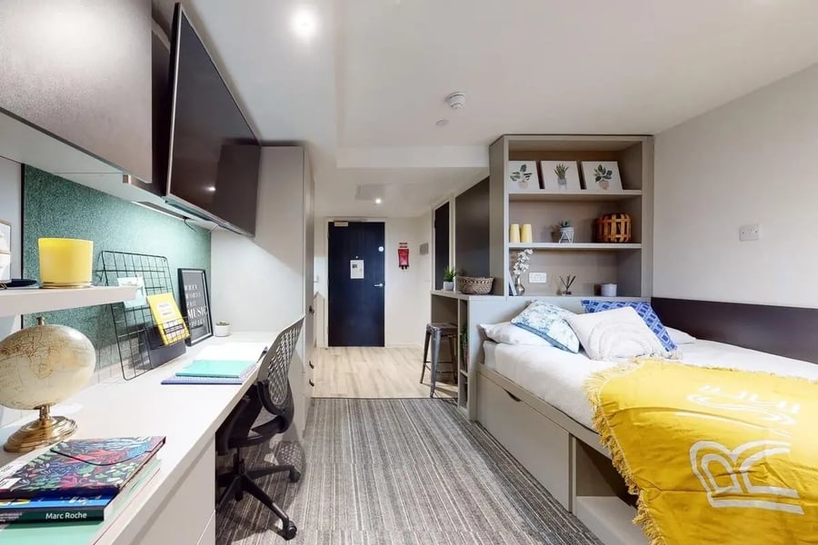 Desk bed bookshelves and TV bedroom at Canvas Coventry City Point in Coventry Student Accommodation