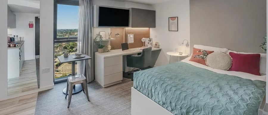 Bed desk kitchen area with furniture Bedroom at Chapter Ealing in London Student Accommodation