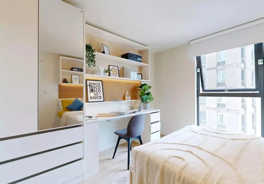 Bed desk shelving mirror and window bedroom at iQ Bristol in Bristol Student Accommodation