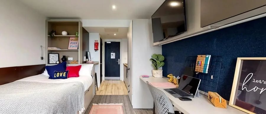 Bed desk shelving and TV bedroom study area at Chapter Ealing in London Student Accommodation