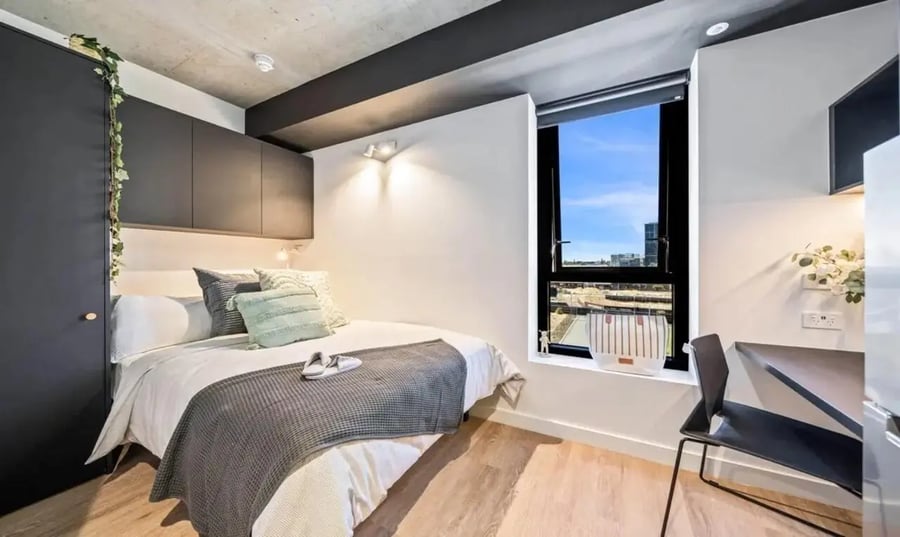 Bed wardrobe and study desk Bedroom at Perth Central in Perth Student Accommodation