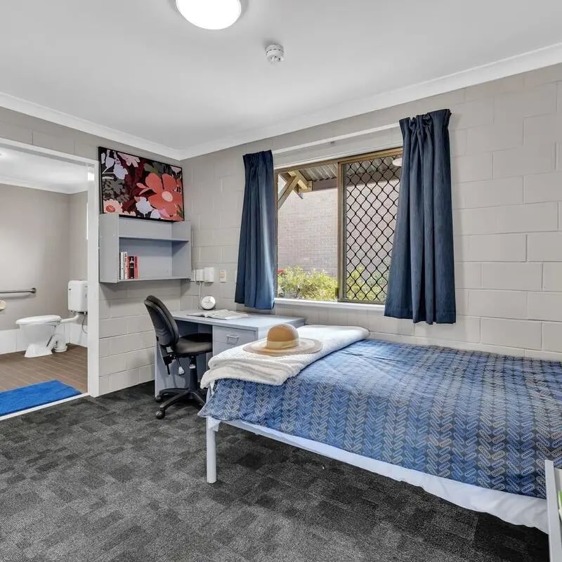 Bed desk and toilet student accommodation bedroom at Murdoch University Village in Perth Student Accommodation