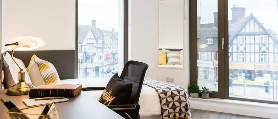 Desk chair bed lamp book study area bedroom at Chapter White City in London Student Accommodation