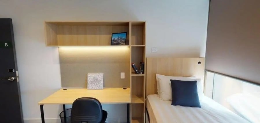 Desk with chair and bed Bedroom at Unilodge Melbourne City in Melbourne Student Accommodation