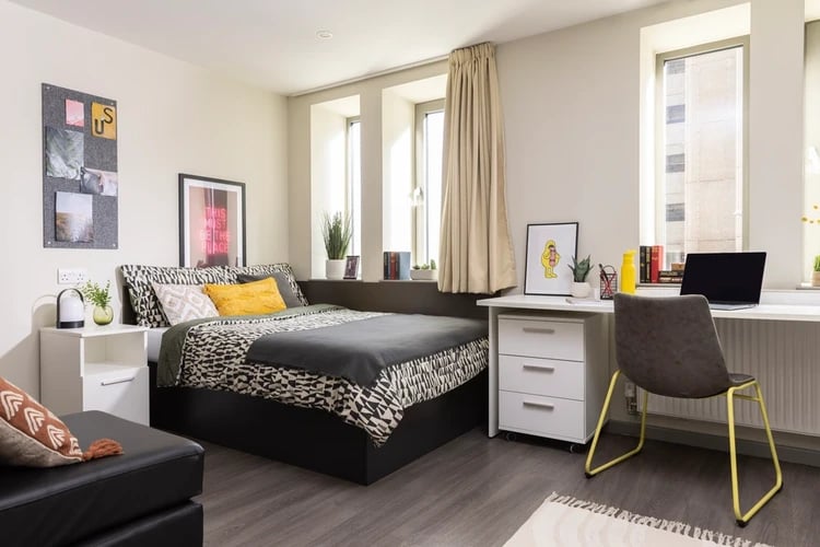 Bed desk and chair student bedroom at Stratford One in London Student Accommodation