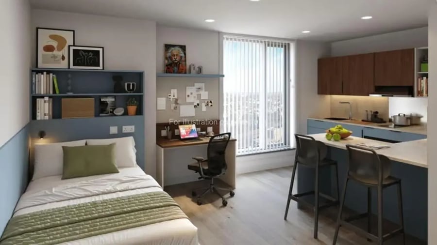 Bed desk kitchen area and counter stools studio apartment at The Propeller Quarter in Bristol Student Accommodation