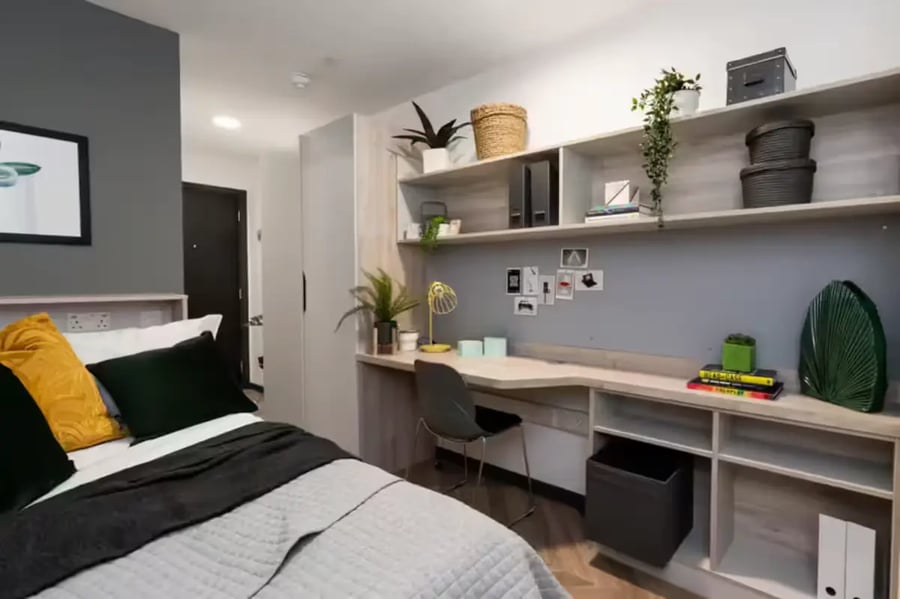 Bed desk shelves with decor and storage bedroom at Steelworks in Sheffield Student Accommodation