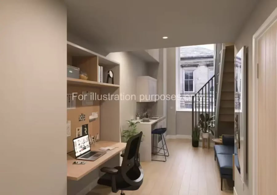 Desk laptop chair kitchen and stairs living area at Glasgow Citi View  in Glasgow Student Accommodation