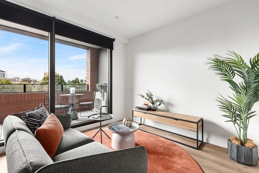 Gray sofa balcony and TV unit living room at Caulfield Place in Melbourne Student Accommodation