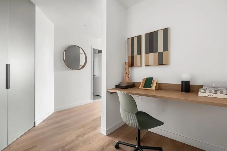 Desk chair artwork and books study area at Caulfield Place in Melbourne Student Accommodation