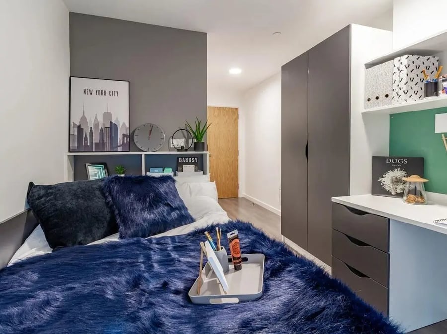 Bed desk and wardrobe bedroom study at Pavilion Court London in London Student Accommodation