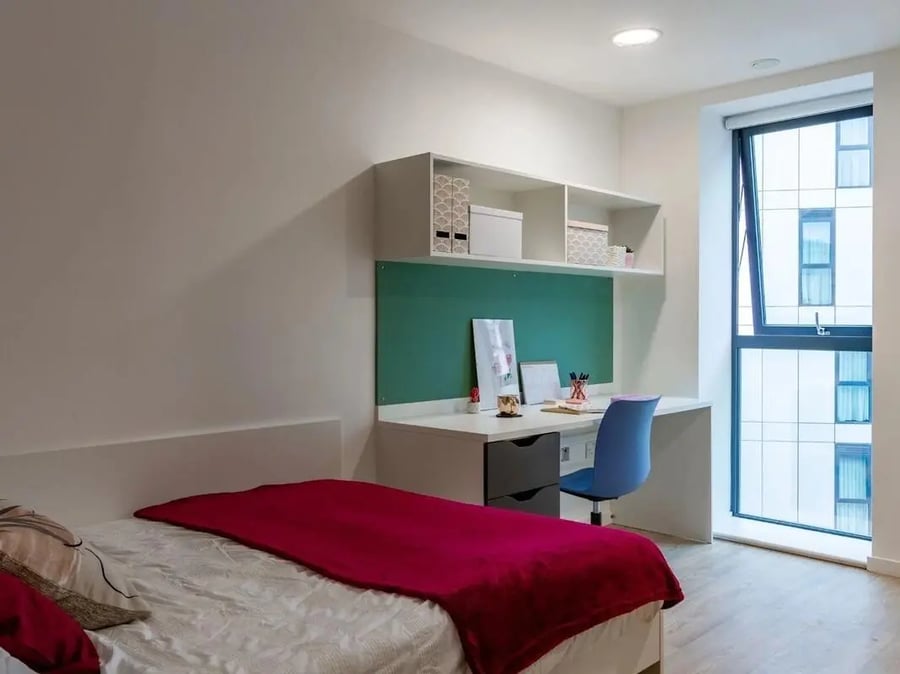 Bed desk shelf chair window bedroom at Pavilion Court London in London Student Accommodation