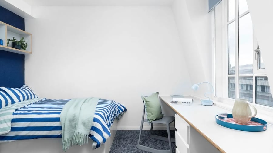 Bed desk chair lamp with window Bedroom at Scape Bloomsbury in London Student Accommodation