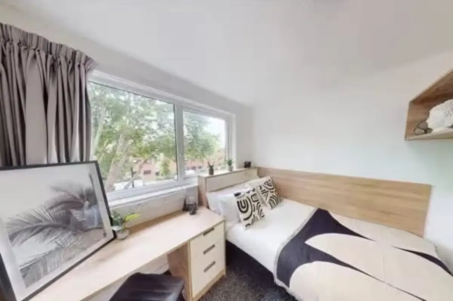 Bed desk art and window bedroom at dwell Cathedral Campus in Liverpool Student Accommodation