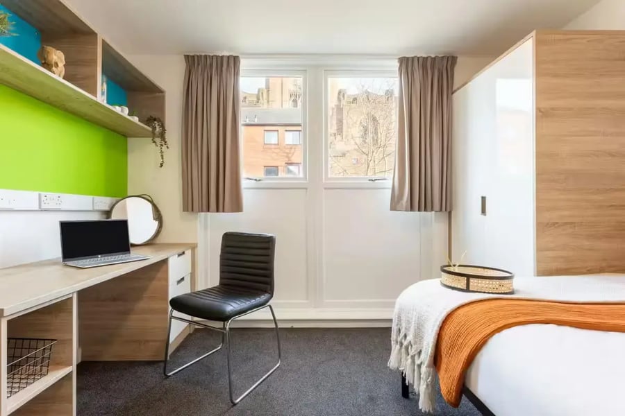 Desk laptop chair bed and wardrobe Bedroom at dwell Cathedral Campus in Liverpool Student Accommodation