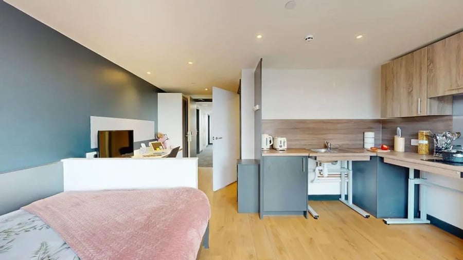 Bed kitchen area and study space living room at Innovo House in Liverpool Student Accommodation