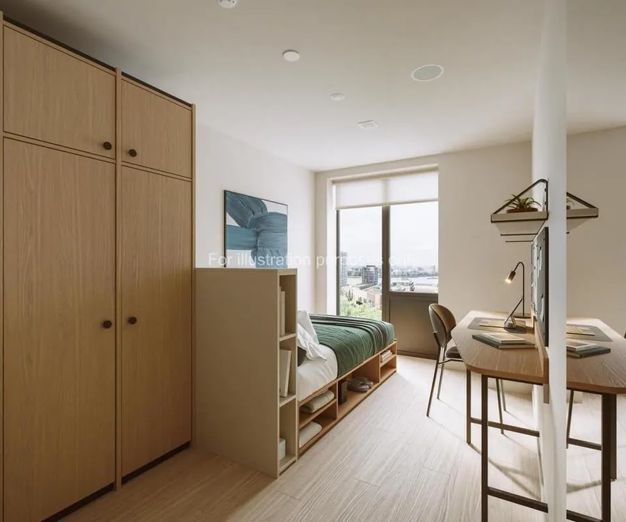 Bed wardrobe desk and chair study area at Press House in London Student Accommodation