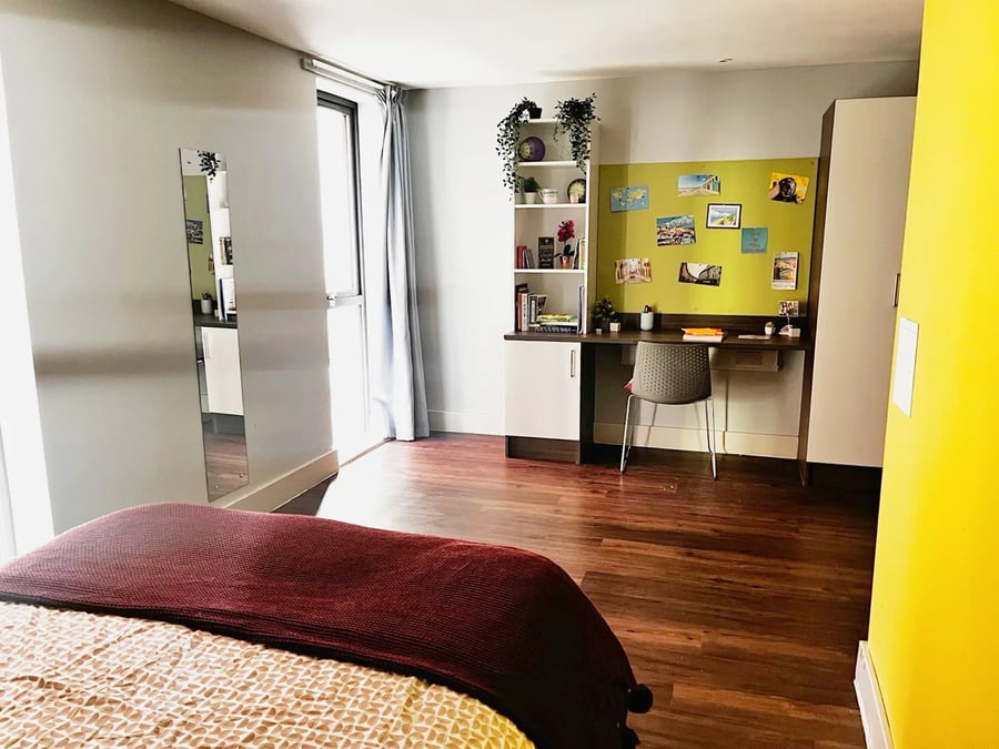 Bed mirror desk chair shelves and storage bedroom at Kaplan Living Bournemouth in Bournemouth Student Accommodation