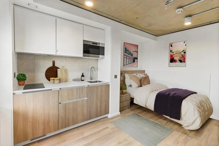 Kitchenette and bed with art bedroom living room at Wembley Arthur House in Wembley Student Accommodation