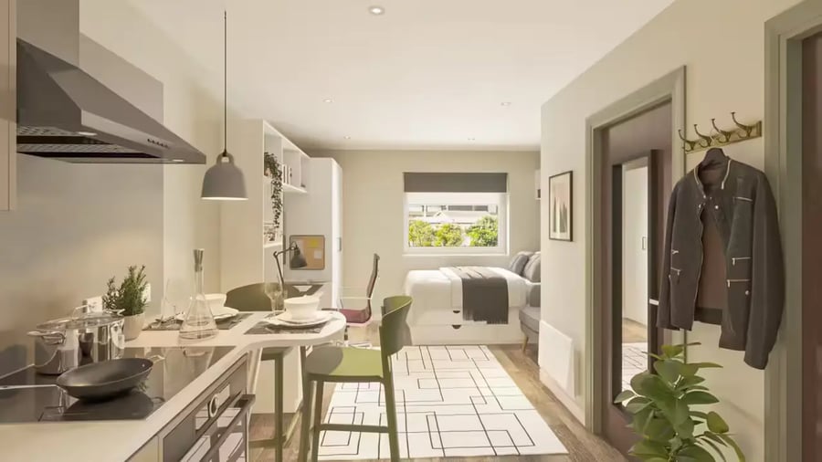Kitchen bed study area and coat rack interior at Trippet Lane in Sheffield Student Accommodation