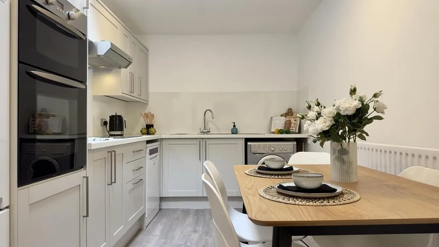 Kitchen with oven sink and dining table kitchen at 6 Bedroom House at 19C, Bower Road in Sheffield Student Accommodation
