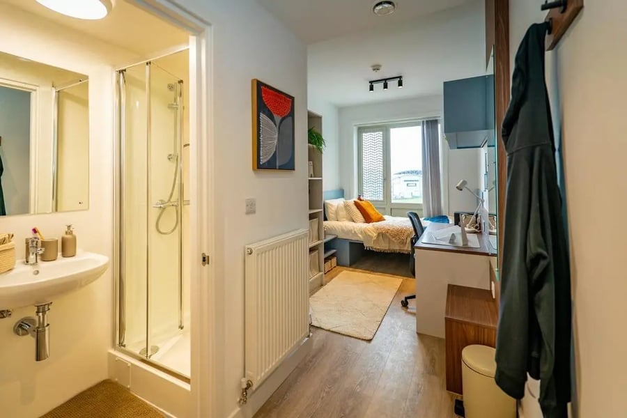 Shower sink bed desk with coat bedroom and bathroom at The Propeller Quarter in Bristol Student Accommodation