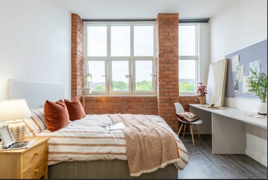 Bed desk chair windows bedroom at Radford Mill in Nottingham Student Accommodation