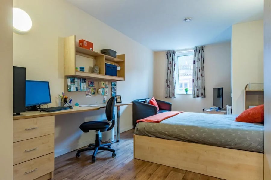 Desk chair monitor bed chair interior bedroom at Chambers 51 in Wolverhampton Student Accommodation