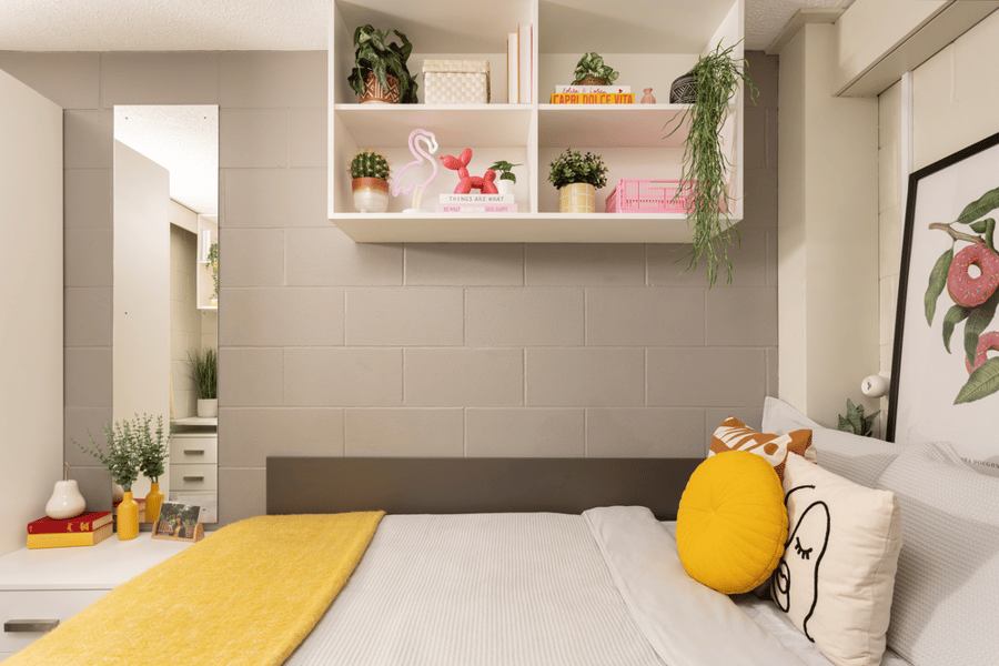 Bed with yellow throw and decor Bedroom at Spring Gardens in Aberdeen Student Accommodation